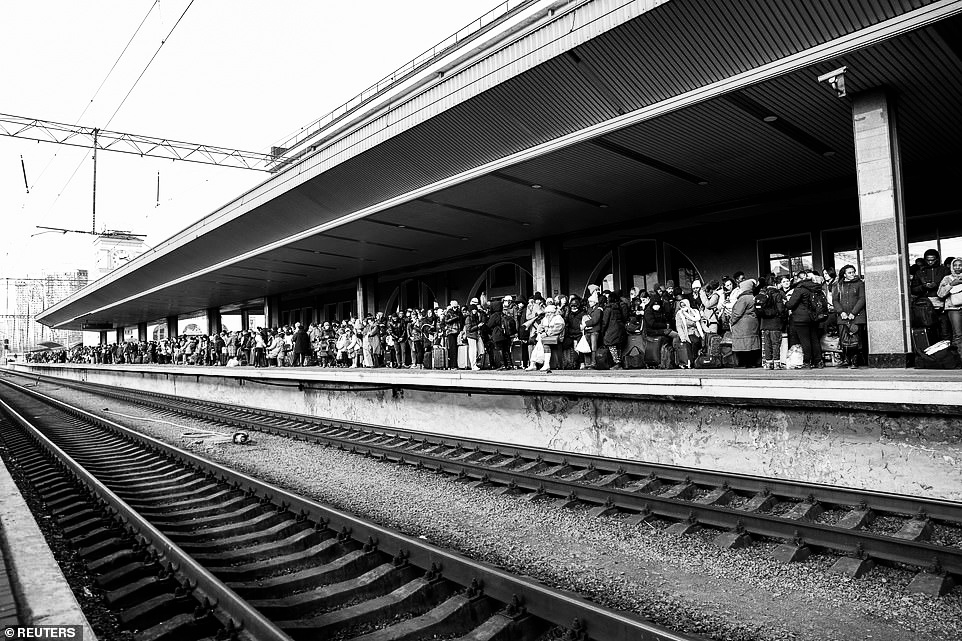 Citizens wait for evacuation train